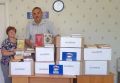В Дедовичах партийцы и жители поселка присоединились к акции по сбору книг для школьных библиотек