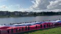 Огромный флаг России развернули на набережной реки Великой в Пскове