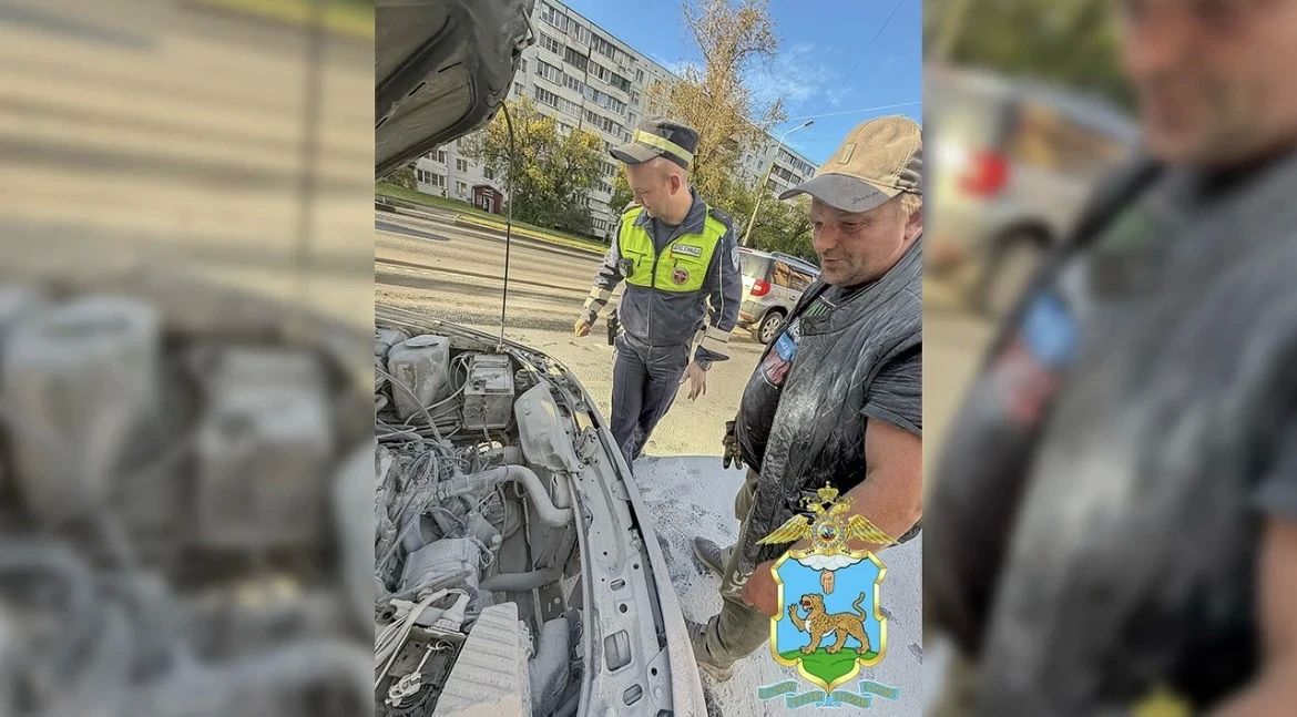В Пскове экипаж ДПС потушил загоревшийся в пробке автомобиль В Пскове экипаж ДПС потушил загоревшийся в пробке автомобиль